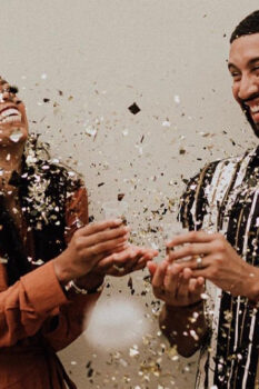 couple celebrating with confetti