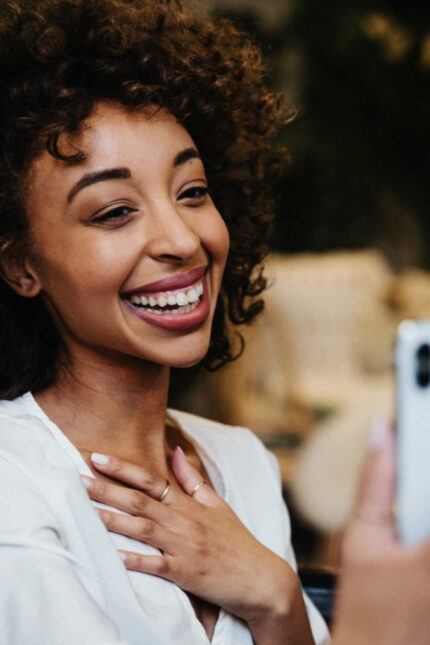 Woman on phone (Courtesy of rawpixel.com)