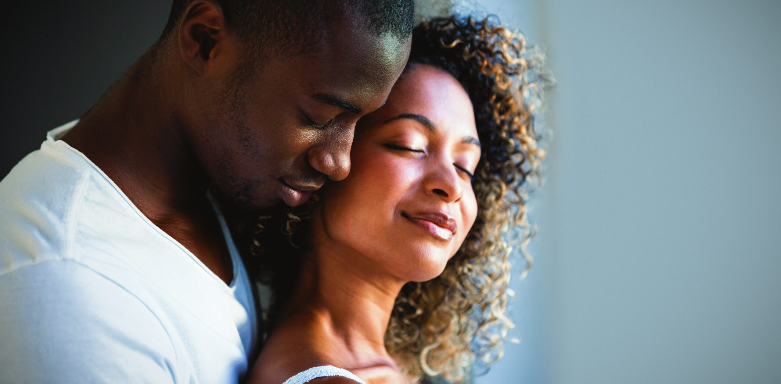 young-couple-embracing-together-2024-10-15-02-50-01-utc